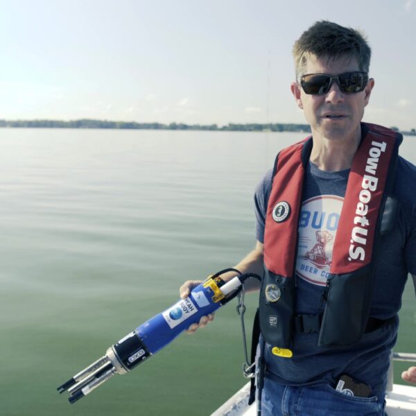 Tim with sonde on Lake Erie