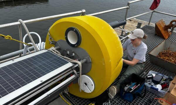 Jessie Grow prepping the Sanctuary Sentinel for deployment. Photo by Caitlin Zant.